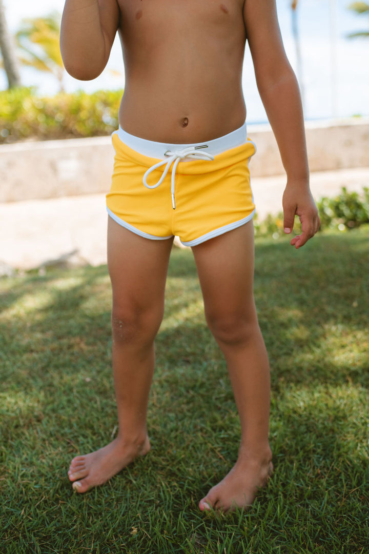 Form fitting European-style toddler boys swim shorts