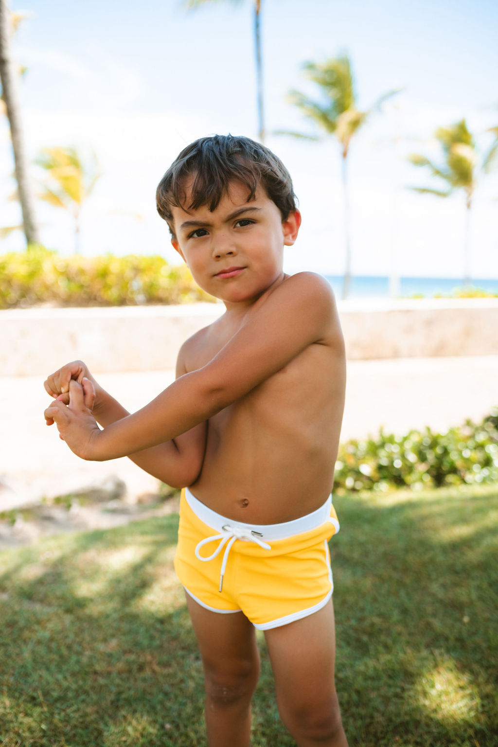 Mini Alex boys swim shorts in water safety yellow